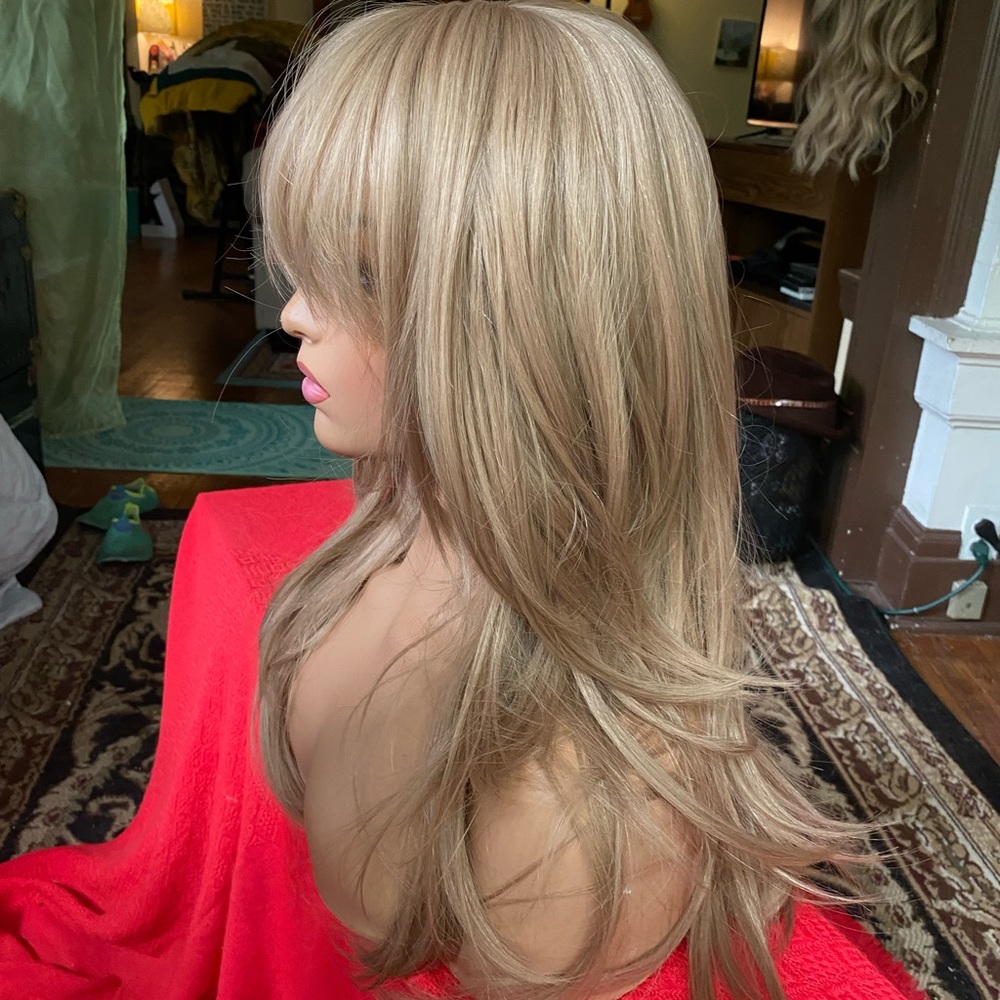 Realistic fawn blonde layered ultra real wig